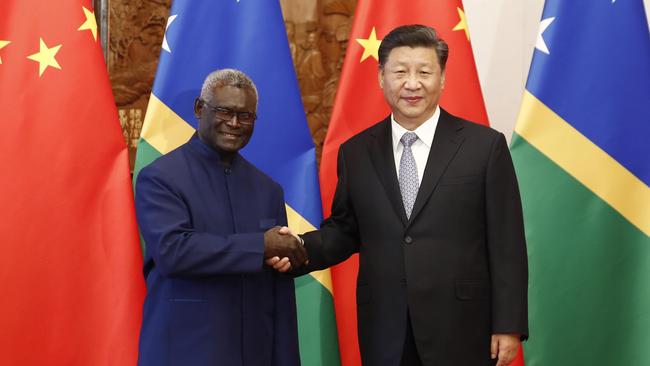 Solomon Islands Prime Minister Manasseh Damukana Sogavare with Chinese President Xi Jinping in 2019. Picture: AFP