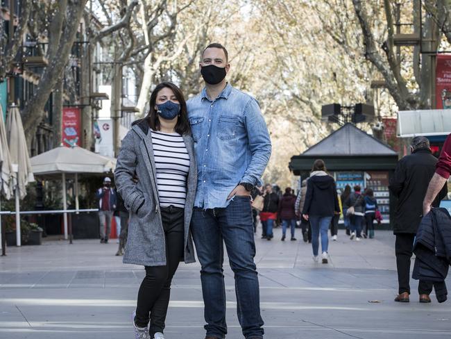 Australian man Nathan Webb, 31, with his girlfriend Carla Barranco Compta, 34, in Barcelona, Spain. Nathan hasn't been able to go back to Australia since the COVID-19 epidemic erupted a year ago. Picture: Ella Pellegrini