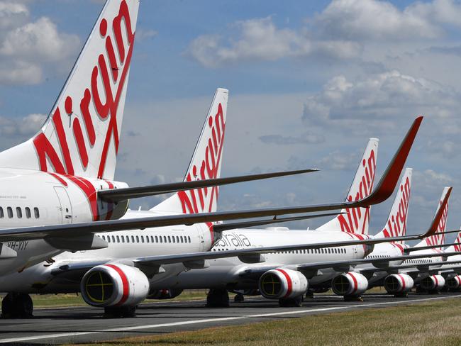 Grounded Virgin Australia aircraft at Brisbane Airport. Picture: AAP.