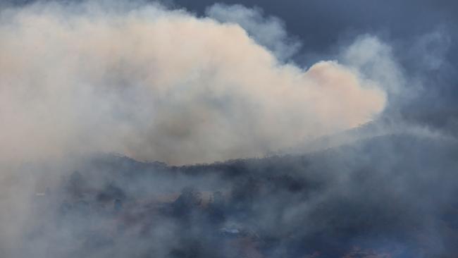 Smoke made it impossible to see Binna Burra lodge when fire spread through the hinterland. Picture: Adam Heads