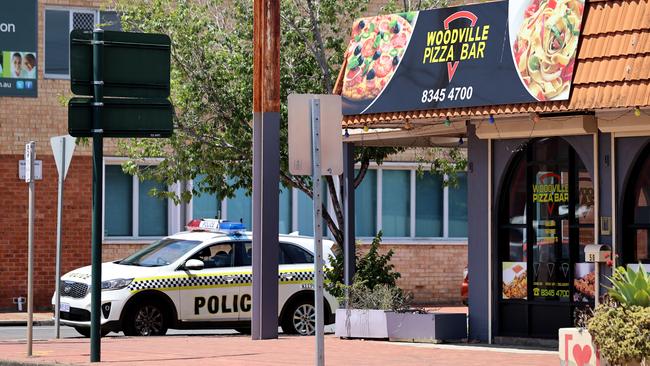 Police outside the Woodville Pizza Bar. Picture: Kelly Barnes/Getty Images