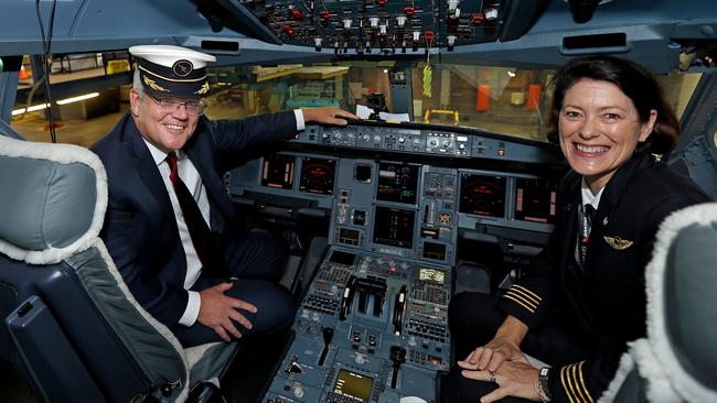 Pilot Prime Minister Scott Morrison and Qantas Pilot Captain Debbie Slade in the cockpit of an Airbus A330.