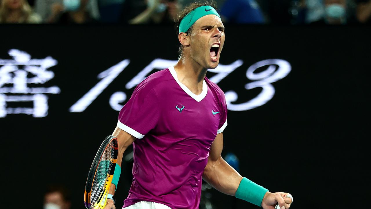 MELBOURNE, AUSTRALIA - JANUARY 30: Rafael Nadal of Spain celebrates winning set point in his Men's Singles Final match against Daniil Medvedev of Russia during day 14 of the 2022 Australian Open at Melbourne Park on January 30, 2022 in Melbourne, Australia. (Photo by Clive Brunskill/Getty Images)