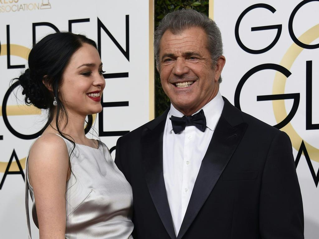 Mel Gibson (R) and girlfriend Rosalind Ross.