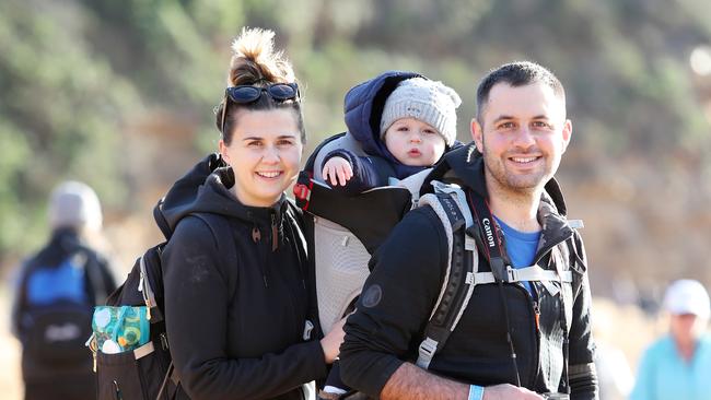 The annual 5 Lands walk from MacMasters Beach Saturday 22nd June 2019 Pip and Josh Jacobs with 14month old Sonny. Picture: Sue Graham