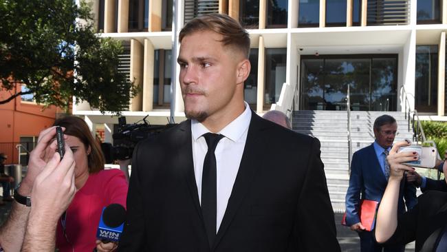 St. George Illawarra Dragons player Jack de Belin (C) has withdrawn the interim injuction against the NRL’s ban. Picture; AAP