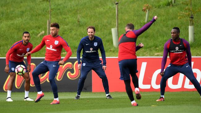 England interim football manager Gareth Southgate (centre) takes part in a training session at St George's Park in Burton-on-Trent.