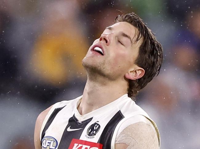 MELBOURNE, AUSTRALIA - JULY 20:  Patrick Lipinski of the Magpies reacts during the round 19 AFL match between Hawthorn Hawks and Collingwood Magpies at Melbourne Cricket Ground, on July 20, 2024, in Melbourne, Australia. (Photo by Darrian Traynor/Getty Images)