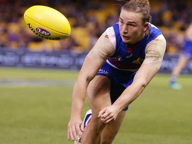 Mitch Honeychurch lunges to mark for the Western Bulldogs. Picture: Michael Klein