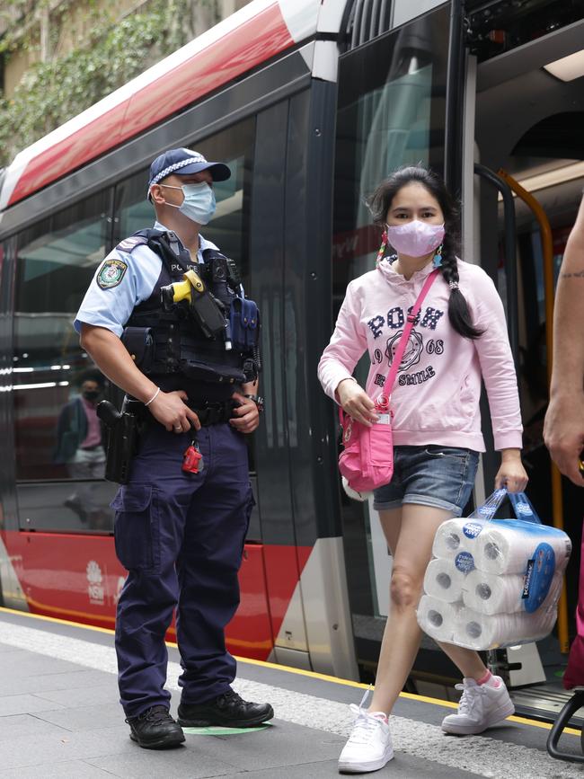 A masked policeman in Martin Place. Picture: Christian Gilles