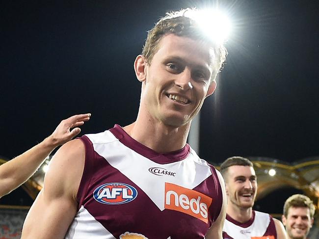 GOLD COAST, AUSTRALIA - MAY 15: Ryan Lester of the Lions holds the QClash trophy during the round 9 AFL match between the Gold Coast Suns and the Brisbane Lions at Metricon Stadium on May 15, 2021 in Gold Coast, Australia. (Photo by Matt Roberts/AFL Photos/via Getty Images)