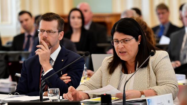 Director-General of the Department of Education Tony Cook (left), and Queensland Minister for Education and Industrial Relations Grace Grace. (AAP Image/Darren England)