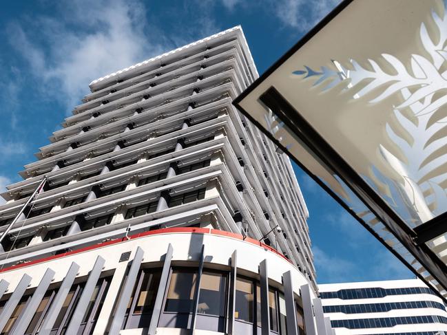 The Reserve Bank of New Zealand (RBNZ) headquarters, left, stands in Wellington, New Zealand, on Thursday, Aug. 9, 2018. New Zealand's central bank said it expects to keep interest rates at a record low for another two years as the outlook for economic growth weakens. Photographer: Birgit Krippner/Bloomberg