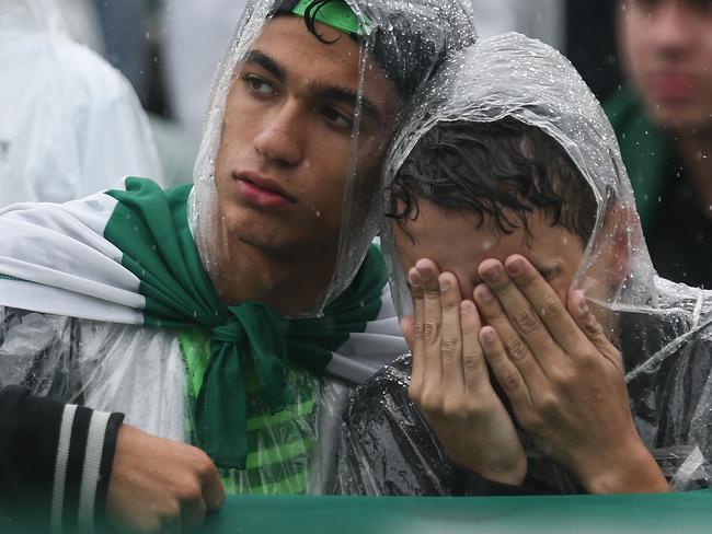 Fans cry at Arena Conda stadium in Chapeco, where a funeral was held for the players and staff of Chapecoense Real. Picture: Buda Mendes/Getty Images