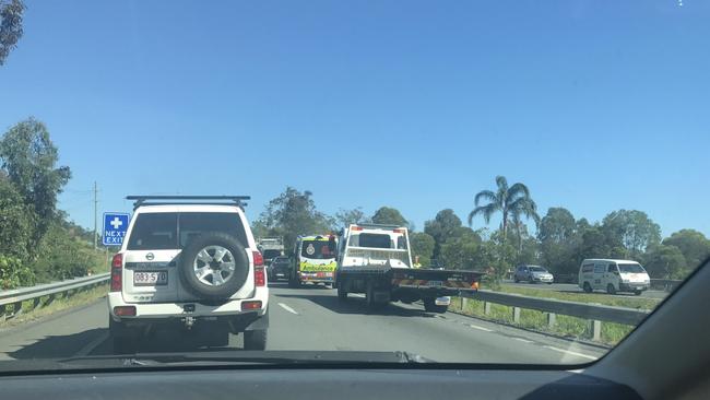 Earlier: Traffic was banked for kilometres after a three-car crash at Robina. Photo: Supplied.