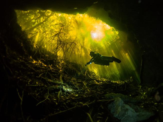 Tajma-Ha. Photographer: Joana Villar Year: 2018 “This photograph was taken while I was scuba diving in Cenote Tajma-Ha, Yucatan, Mexico. The yellowish colour of the water is obtained from the high levels of tannic acid there. I’m a PADI instructor and a certified full cave diver. These pictures were taken during a fun dive in the Cenotes.” Copyright: © Joana Villar, Portugal, Entry, Open, Landscape & Nature, 2018 Sony World Photography Awards