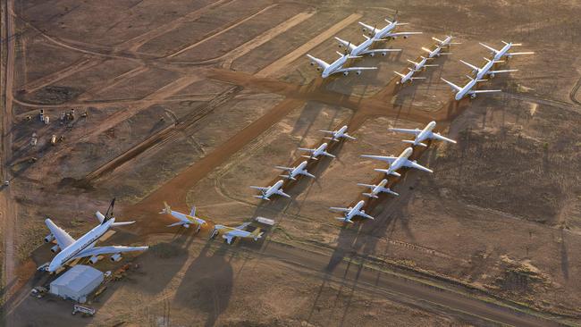 International carriers like Singapore Airlines used Alice Springs Airport to mothball its fleet, with some $5bn in aircraft stored at the pandemic’s peak. Picture: Steve Strike