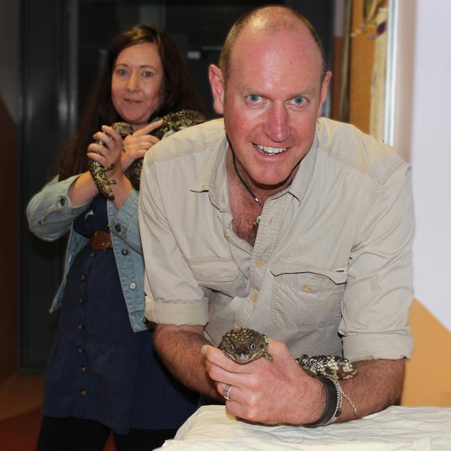 Flinders University researchers Professor Mike Gardner and Dr Jess Clayton with some other lizards in the laboratory. Picture: Flinders University