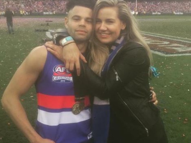 Abby Gilmore with Jason Johannisen on grand final day, 2016.