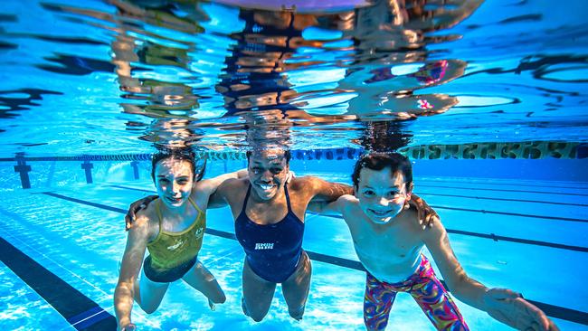 Para swimmer Victoria Belando Nicholson (middle) with swimmers Maggie Butler, 11 and Jake MacDonald, 10. Picture: Nigel Hallett