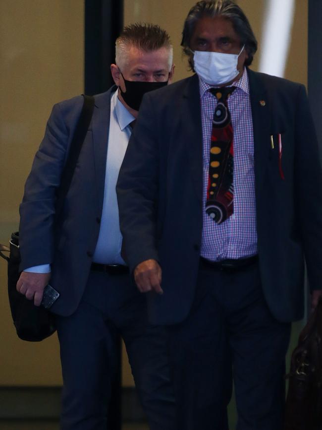 Andrew Svenson (left) hides behind his lawyer. Picture: Nikki Short