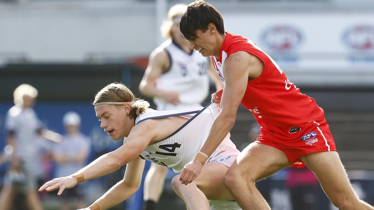 Lachlan Carrigan (right) could find a home at the Blues. Picture: Daniel Pockett/AFL Photos/via Getty Images