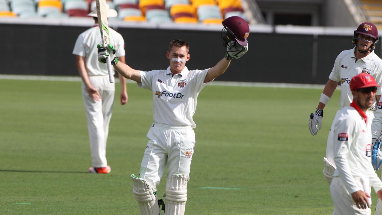 Marnus Labuschagne raises bat to crowd after reaching 100 runs for Qld Bulls vs SA at Gabba. - pic Adam Smith