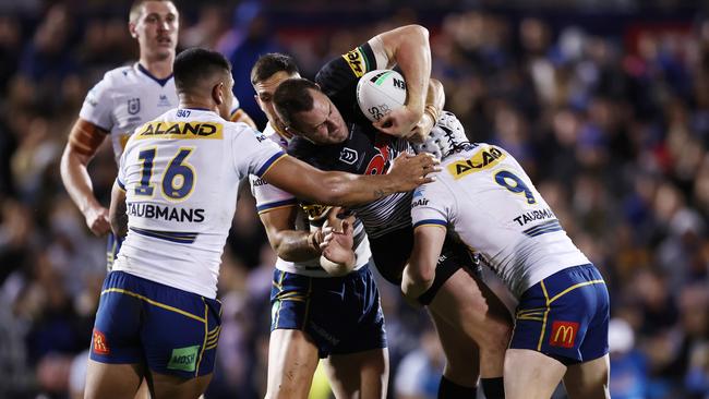 Panthers captain Isaah Yeo is wrapped up by the Eels defence. Picture: Matt King/Getty Images