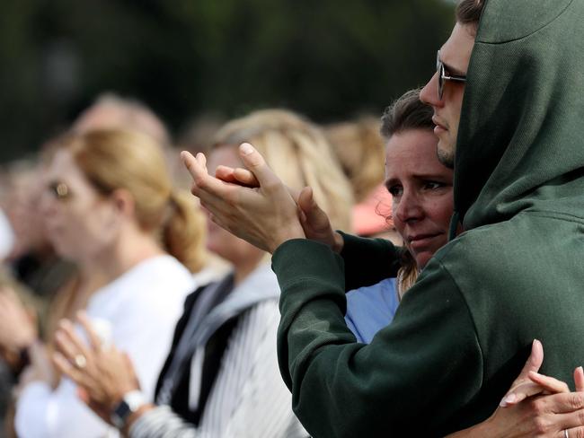 Members of the public attend the National Remembrance Service at North Hagley Park in Christchurch on March 29, 2019. - The remembrance ceremony is being held in memory of the 50 lives that were lost in the March 15th mosque shootings in Christchurch. (Photo by STR / AFP)