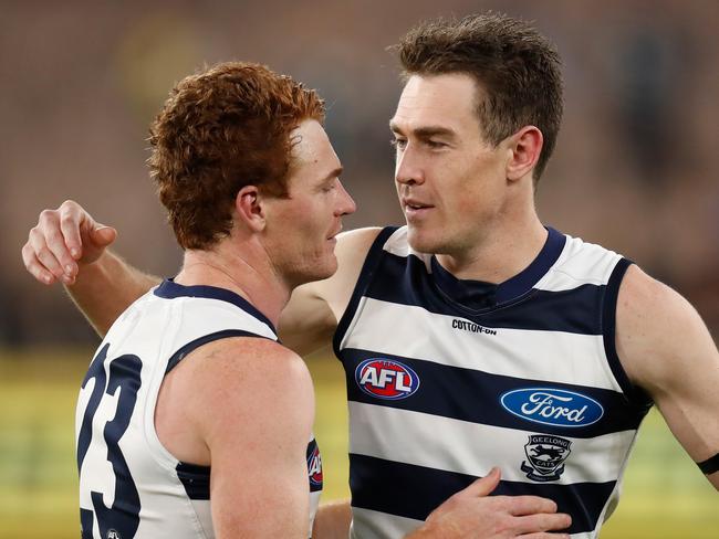 Gary Rohan and Jeremy Cameron share a moment. Picture: Michael Willson/AFL Photos via Getty Images