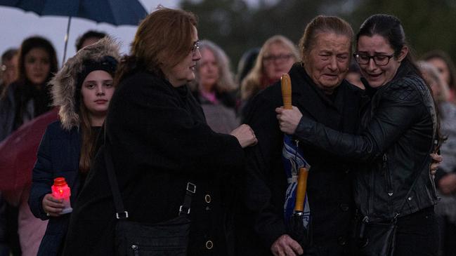 Mourners at the vigil for slain woman Courtney Herron. Picture: AAP