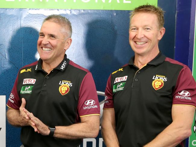 Former Hawthorn football operations manager Chris Fagan (middle) is the new Brisbane Lions coach, with Greg Swann (left) and David Noble, new Lions Football manager. Pic Jono Searle.