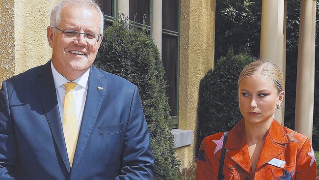 Ms Tame didn’t smile when she posed with Mr Morrison. Picture: NCA NewsWire / Gary Ramage Picture: NCA NewsWire / Gary Ramage