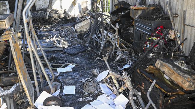 The charred wreck of the shed at Christies Downs. Picture Mark Brake