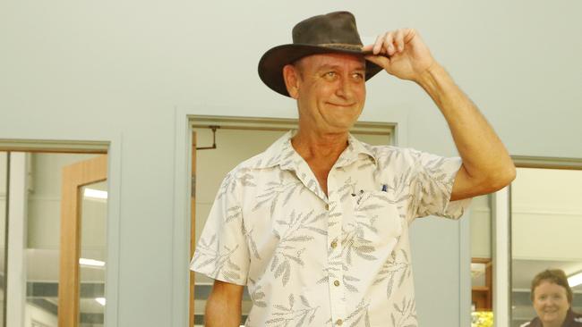 Mayoral hopeful Andrew Middleton gets his nomination in at the last minute at the ECQ office at Palm Beach as nominations close. Returning officer Karen Barany looks on. Picture Glenn Hampson