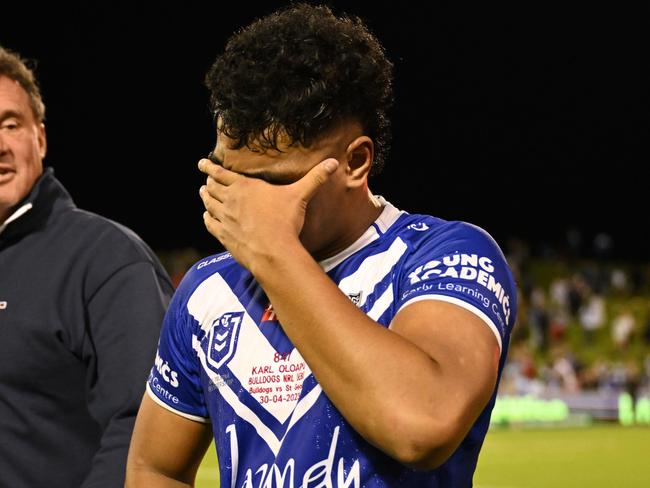 Karl Oloapu celebrates with his family after Bulldogs debut. Picture: NRL