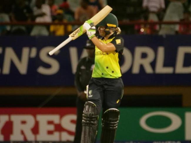 Alyssa Healy celebrates her third half century of the tournament.