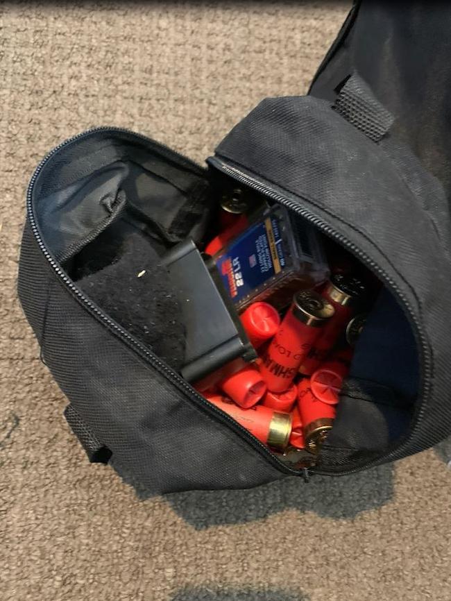 Police say a large quantity of ammunition was found.