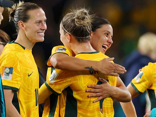 SYDNEY, AUSTRALIA - AUGUST 07: Steph Catley and Sam Kerr of Australia celebrate the teamÃ¢â¬â¢s 2-0 victory and advance to the quarter final following the FIFA Women's World Cup Australia & New Zealand 2023 Round of 16 match between Australia and Denmark at Stadium Australia on August 07, 2023 in Sydney / Gadigal, Australia. (Photo by Cameron Spencer/Getty Images)