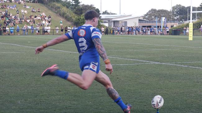 Beerwah player Tom McClure converts from the sideline. Picture: Patrick Gillett.