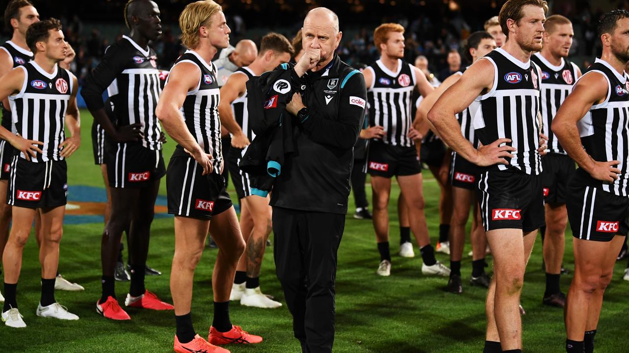 Dejected Port players and their coach Ken Hinkley after losing to the Crows. Picture: Getty Images