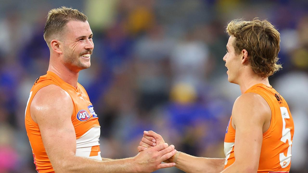 Kieren Briggs (left) says he’s confident Aussie rules can continue to grow in western Sydney, where he once accidentally discovered the game. Picture: James Worsfold / Getty Images