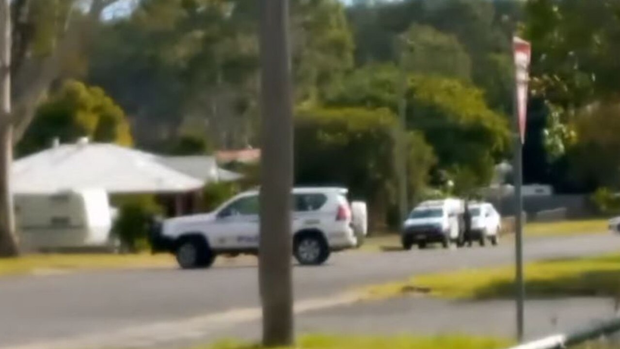 Police swarm man armed with crossbow in six-hour siege