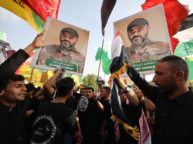 The funeral of a military commander from the Hezbollah Brigades who was killed on September 20, in a strike targeting the pro-Iran faction in Syria. Picture: AFP