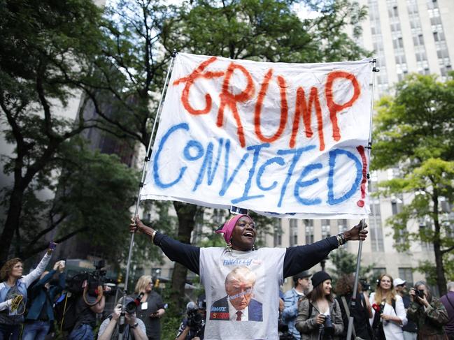People react in the street after former US President and Republican presidential candidate Donald Trump was convicted in his criminal trial outside of Manhattan Criminal Court in New York City. Picture: AFP