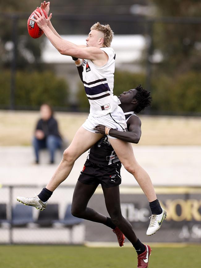 Nate Caddy marks for the Northern Knights.