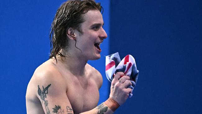 Australia's Cassiel Rousseau reacts after his fival dive in the men's 10m platform diving final during the Paris 2024 Olympic Games at the Aquatics Centre in Saint-Denis, north of Paris, on August 10, 2024. (Photo by Manan VATSYAYANA / AFP)