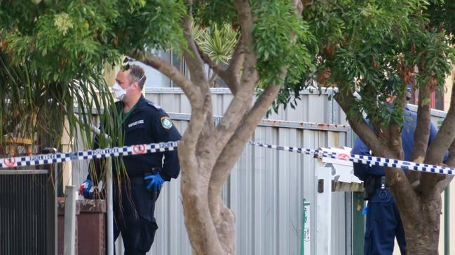 Forensic police are on the scene of a fatal shooting at Queen St, Stockton. Strike Force Backhouse is investigating. Picture: Emily Burley.