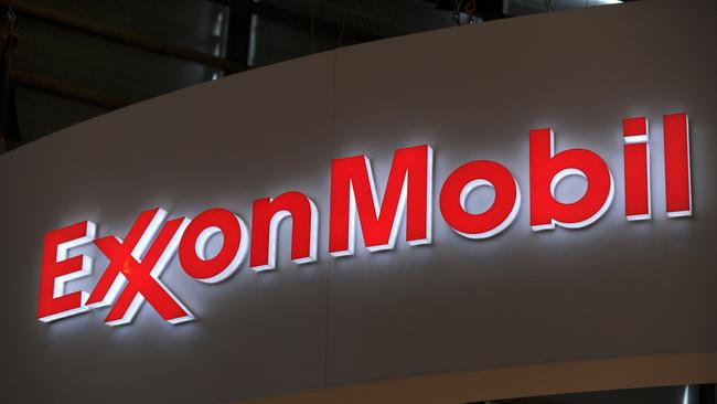 (FILES) In this file photo taken on June 2, 2015 the logo of US oil and gas giant ExxonMobil is seen during the World Gas Conference exhibition in Paris. - A New York judge sided with Exxon Mobil on December 10, 2019 in a closely-watched environmental case, concluding the oil giant did not mislead investors in its climate change disclosures. The ruling by Barry Ostrager, a judge in the New York state court, rejected arguments by New York's Attorney General that the oil giant duped investors by downplaying the costs of mitigating climate change. (Photo by ERIC PIERMONT / AFP)