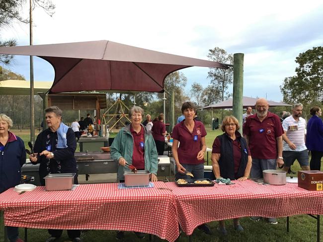 Cecily Burkett, Mary Cochrane, Shirley Harvey, Kay Drew, Trish Doherty, and Linton Harvey at an Anzac Service Breakfast.